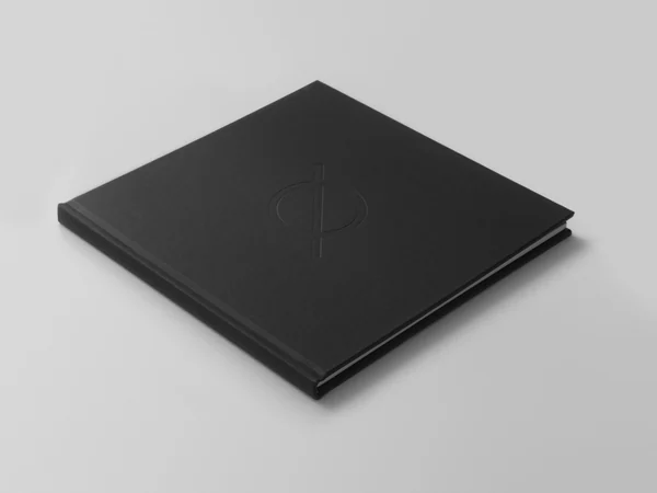 The black edition of the Ø art book, closed and viewed at an angle.