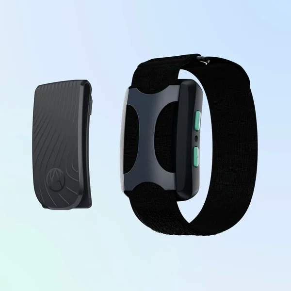 A black wearable device and wristband against a blue background.